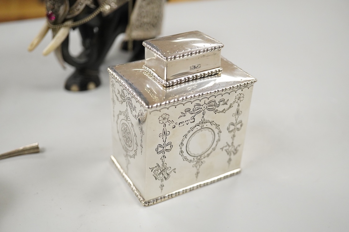 A George V engraved silver rectangular tea caddy, by Nathan & Hayes, Chester, 1913, 81mm, together with an Edwardian repousse silver mounted ring box by Nathan & Hayes, Chester, 1905, a Scottish silver and tortoiseshell